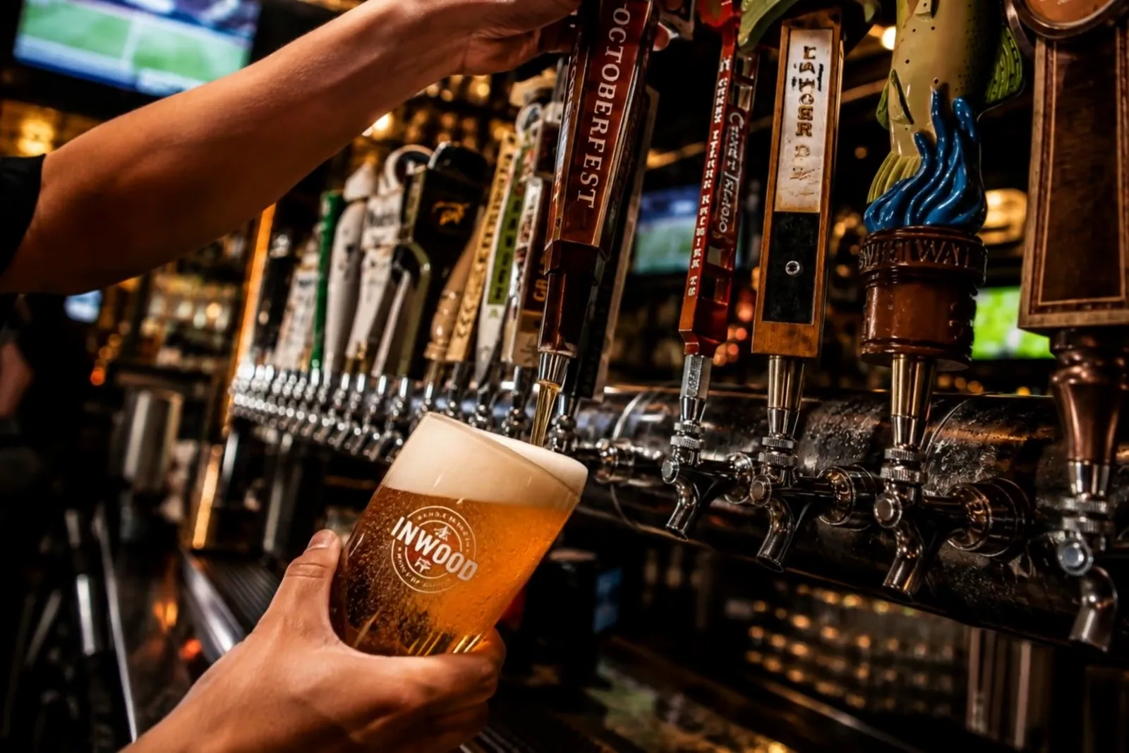 Draft beer taps, video still from the new drinks page