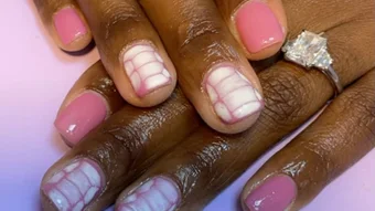 A manicure photo replaced by the new suite video